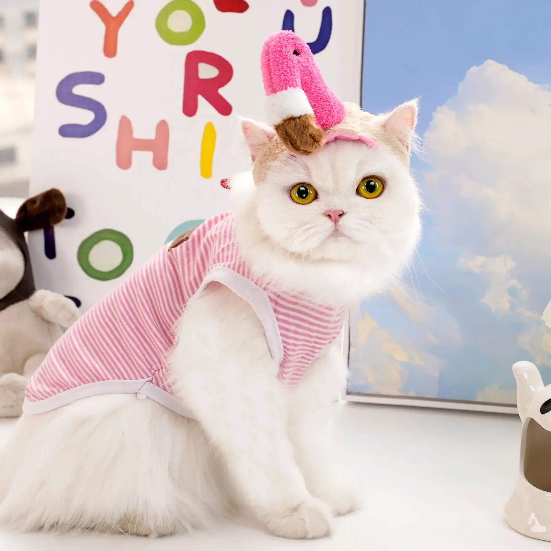 Cat wearing a funny cat hat for costumes styled as an ice cream cone, perfect for playful pet apparel