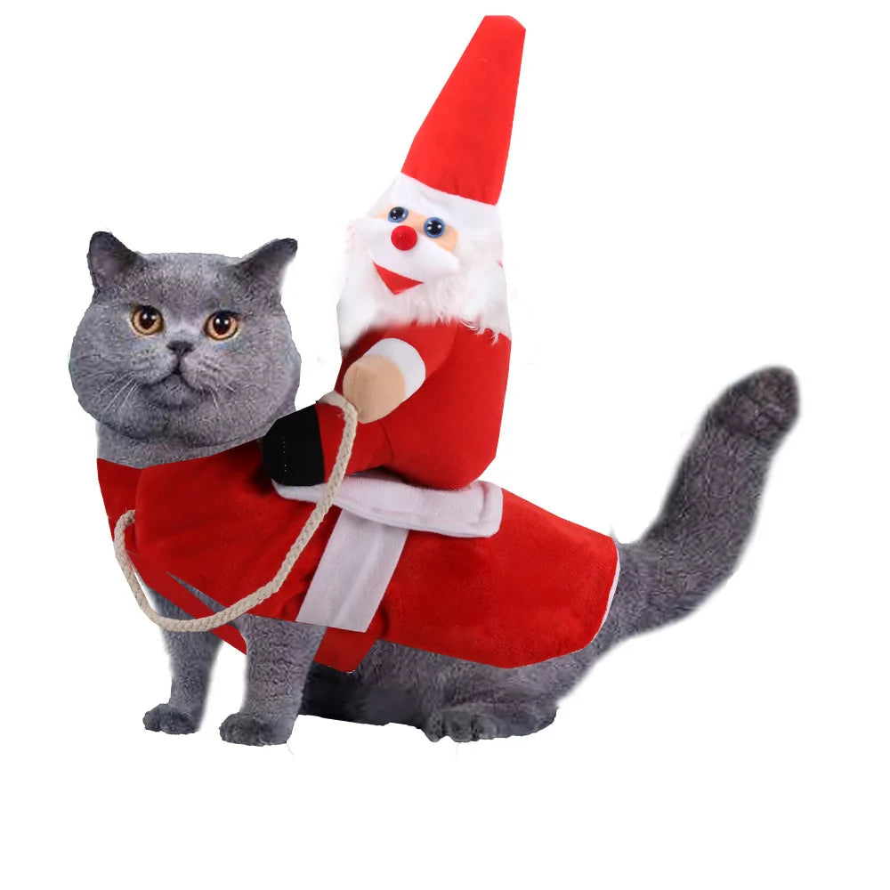 Funny dog costumes for Halloween featuring a gray cat in a Santa outfit with a plush Santa Claus riding on its back