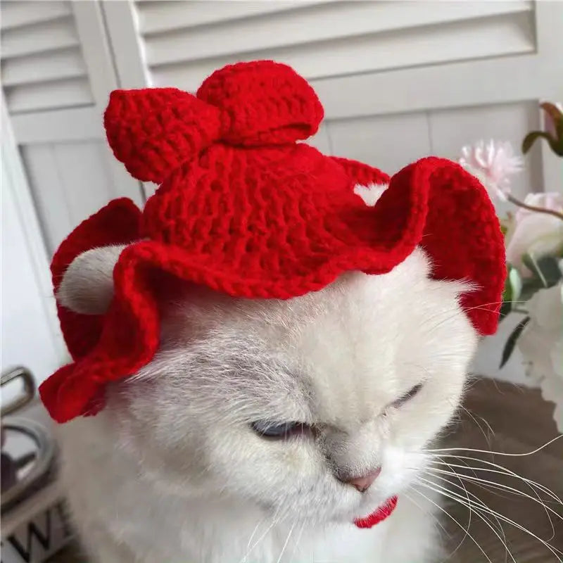 Cute red knitted funny pet hats for cats and dogs with a large bow on top
