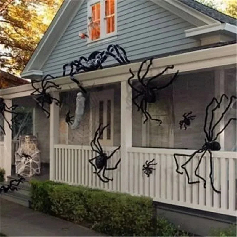 Giant Halloween spider decoration displayed on a spooky front porch for festive outdoor decor