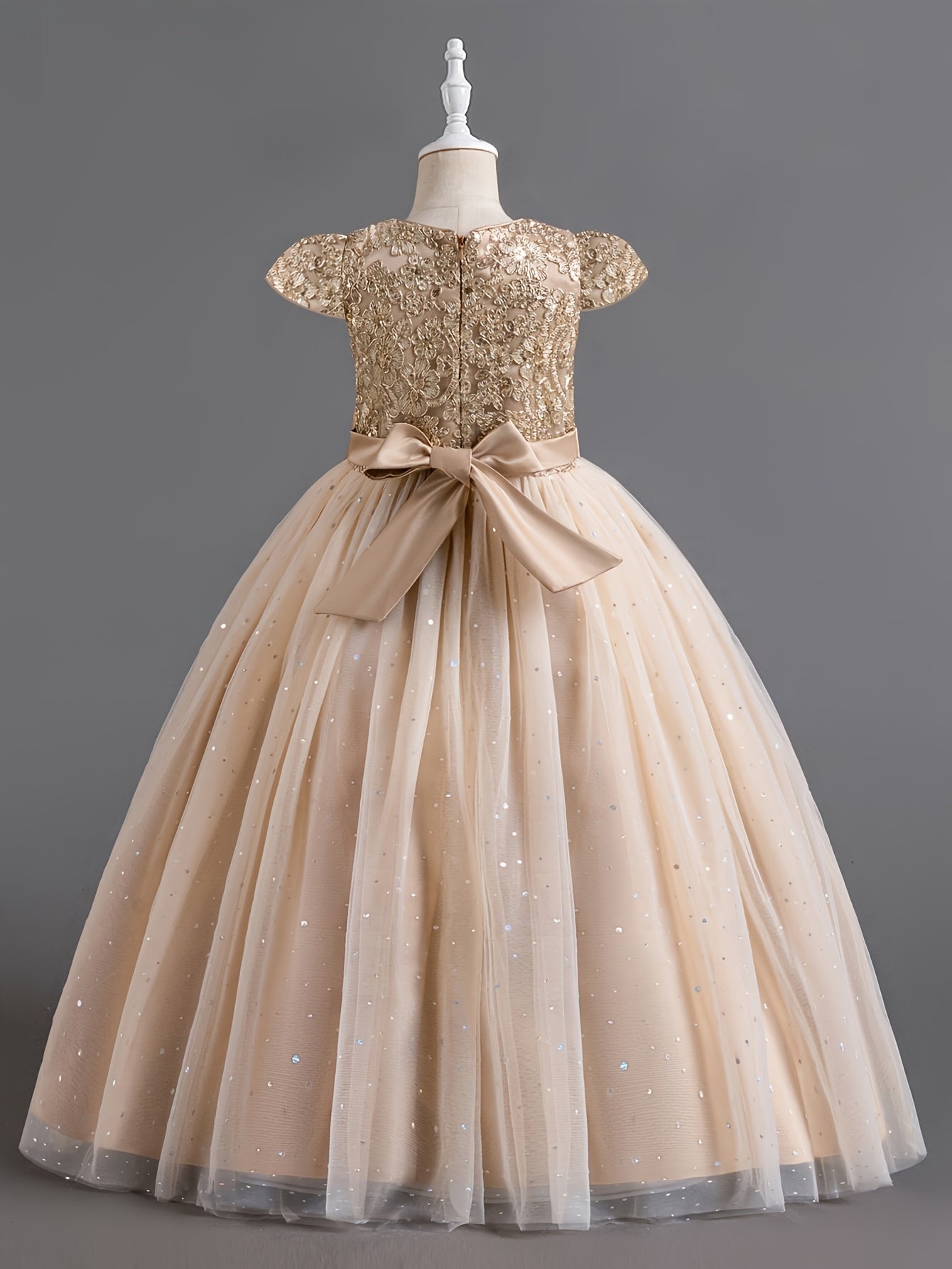 Girls floral wedding dress with gold sequined bodice and tulle skirt finished with a satin bow