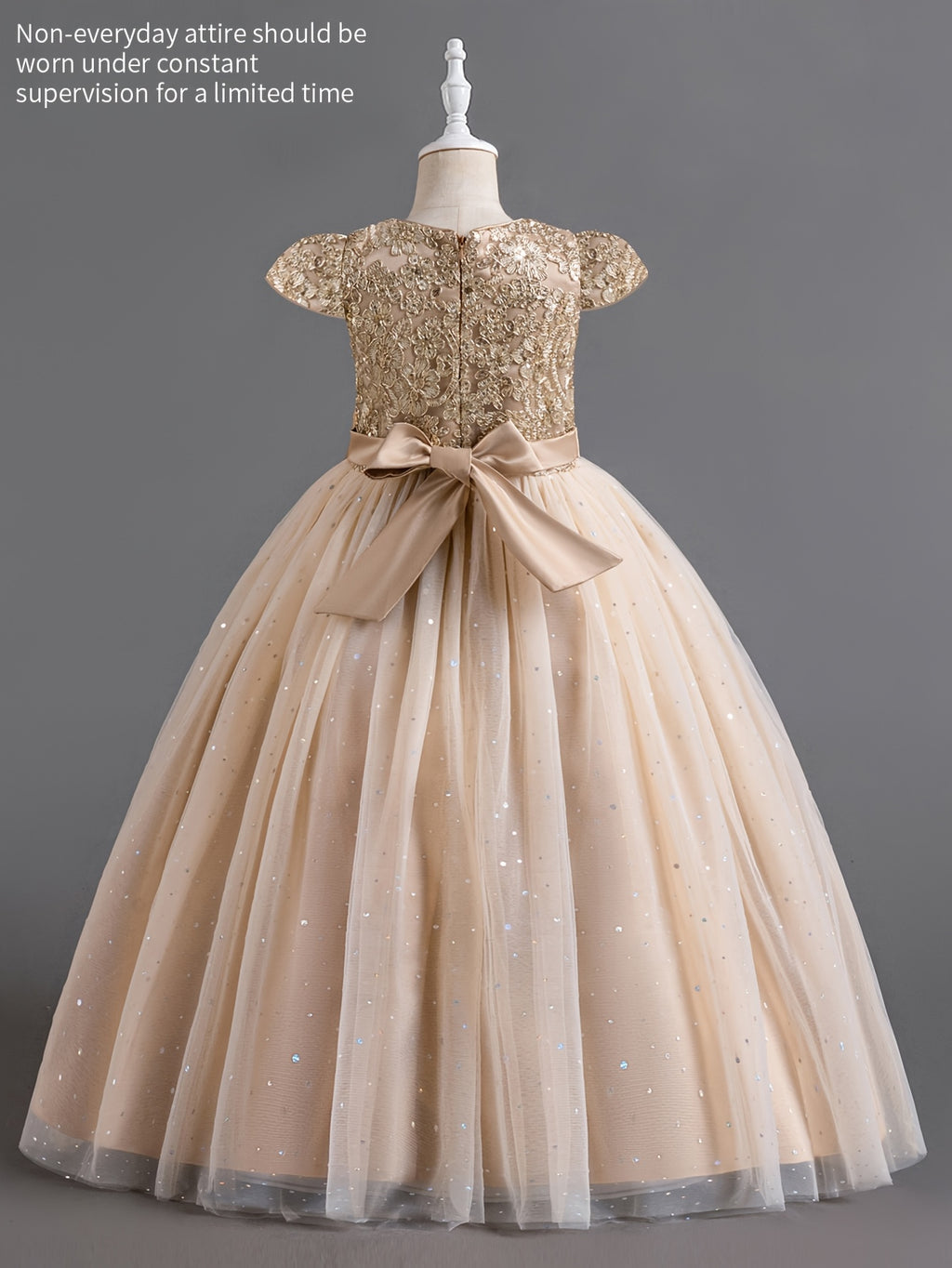 Elegant girls floral wedding dress with a gold sequin bodice and a flowing tulle skirt