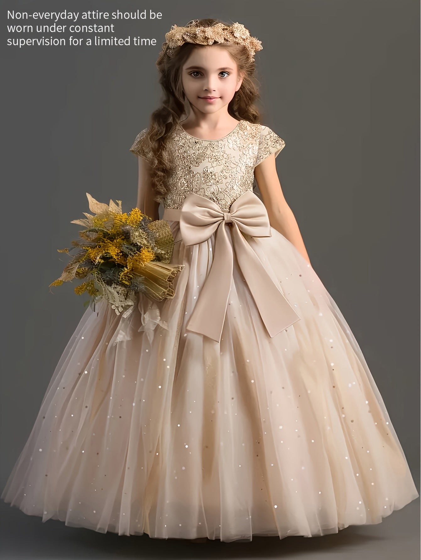 Girls floral wedding dress in beige with lace top and bow, perfect for special occasions