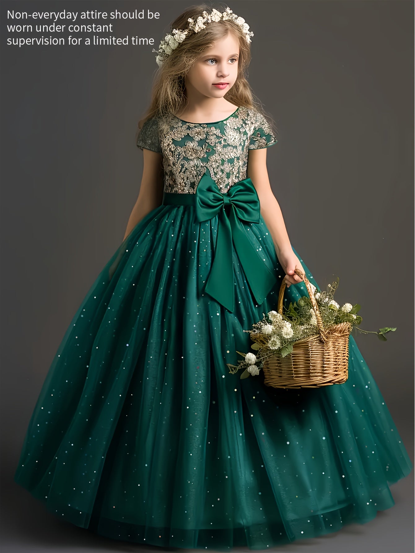 Girls floral wedding dress in green with lace top and bow, perfect for special occasions