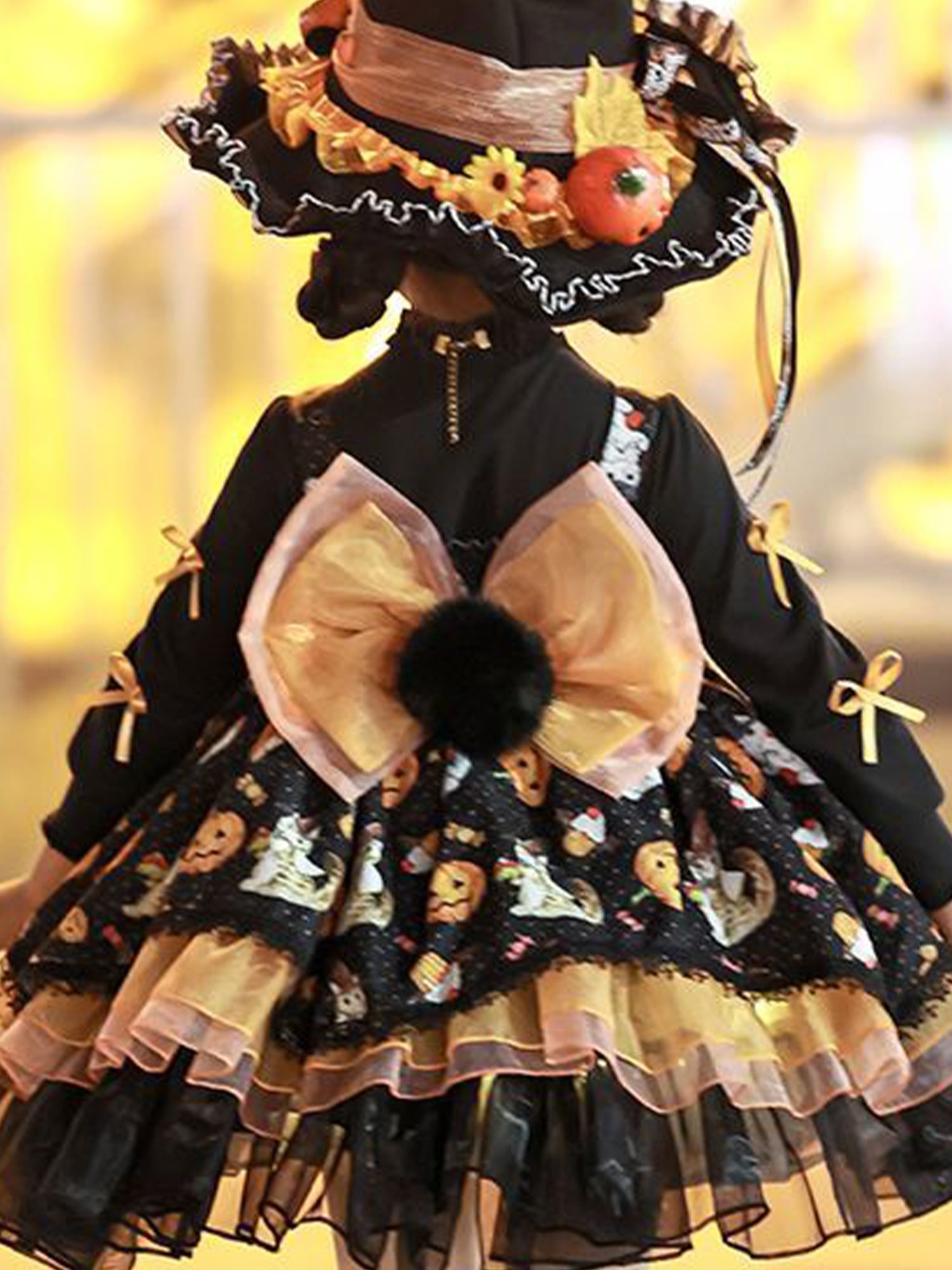 Cute girls Halloween party dress with a festive design and big bow for festive celebrations