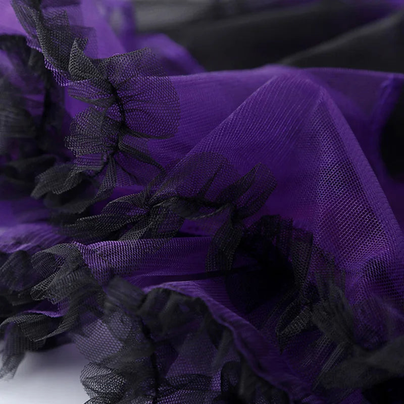 Girls purple bat costume fabric with black ruffled accents for a fun Halloween look