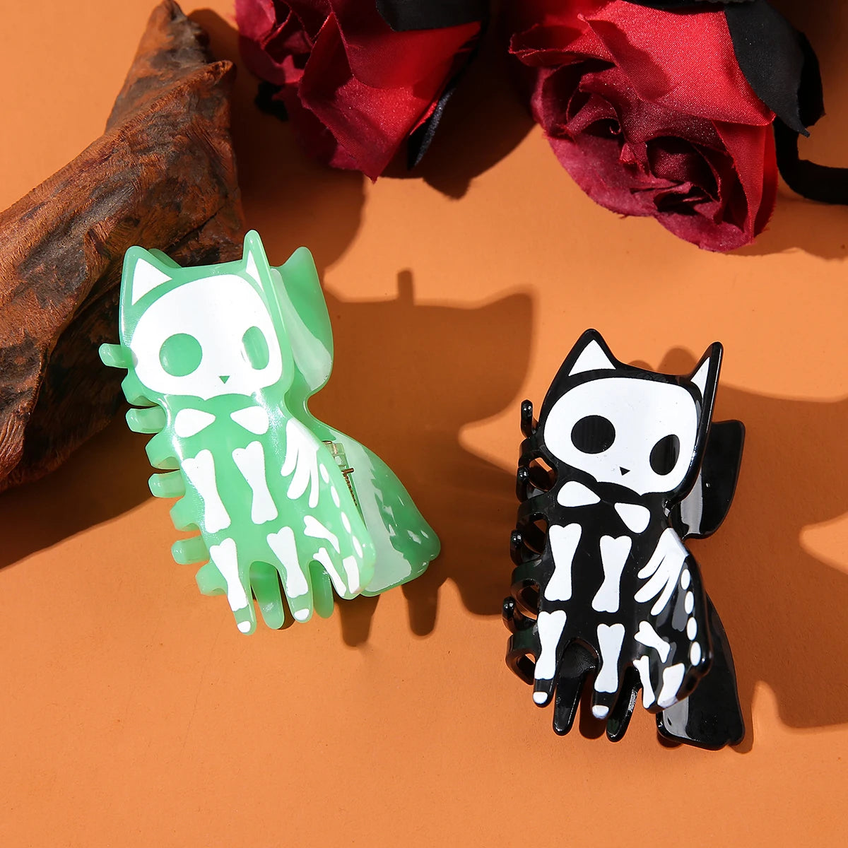 Halloween acrylic skull hair accessory featuring spooky cat designs in green and black