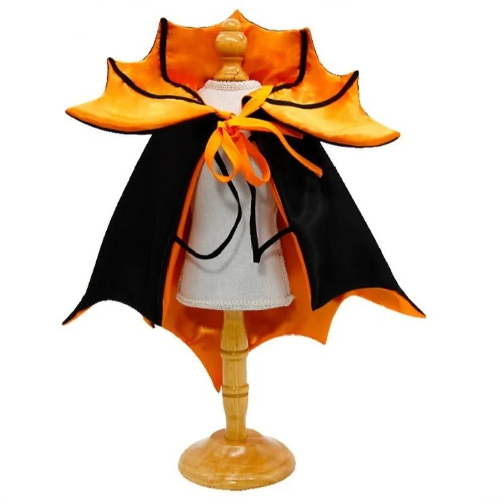 Halloween cat costume bat cloak in black and orange with a ribbon tie for festive pets