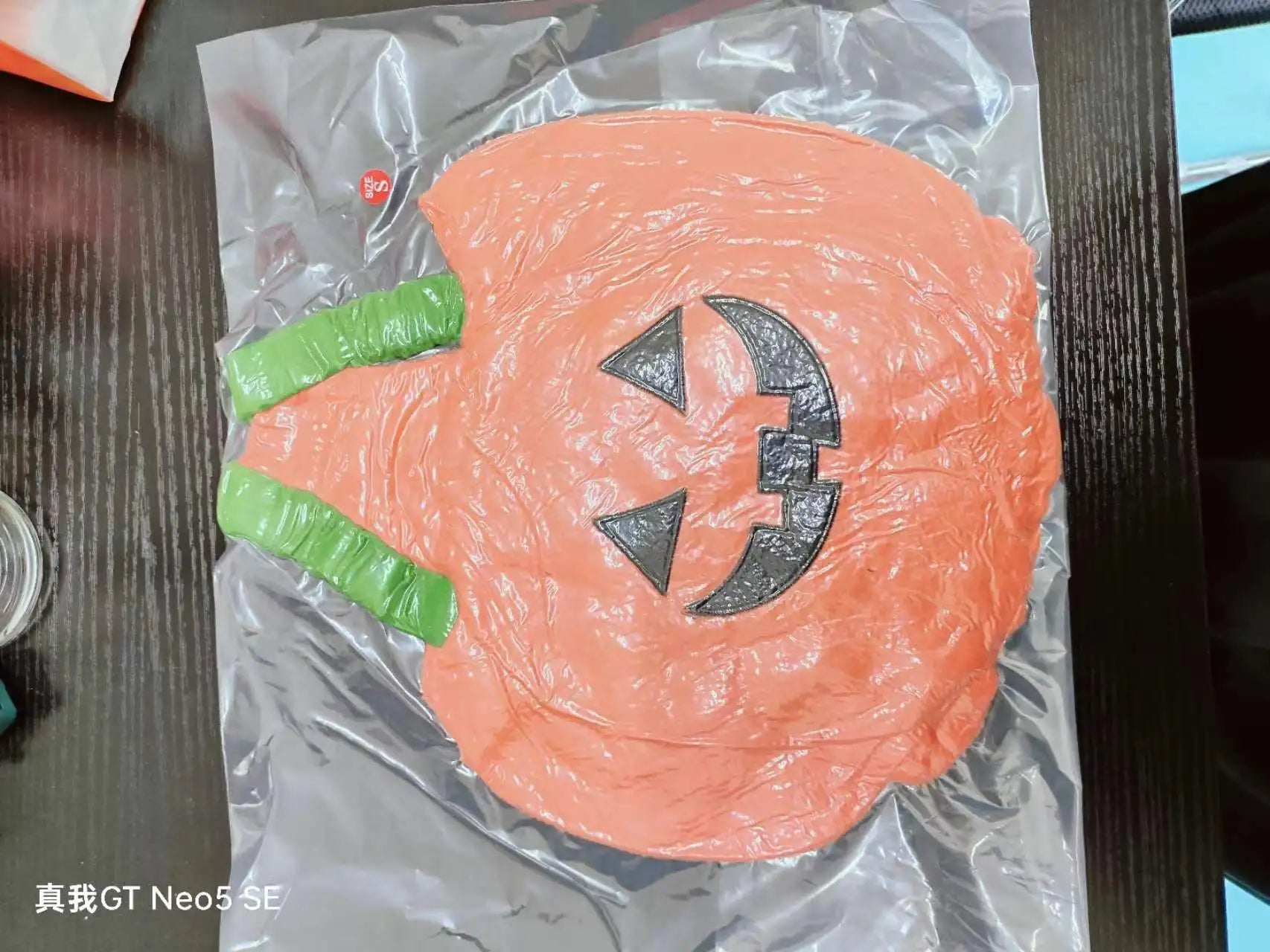 Zoomies & Co Halloween Christmas dog costume featuring a pumpkin design in bright orange and black details