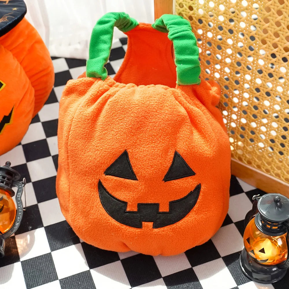 Halloween Christmas dog costume in orange pumpkin design with black face details and green handles