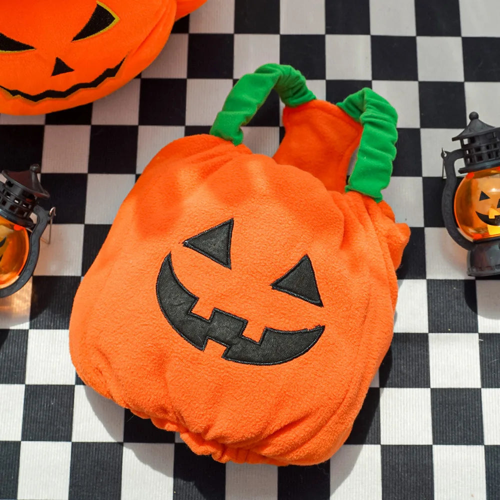 Pumpkin-themed Halloween Christmas dog costume with a smiling face design for festive pet dressing