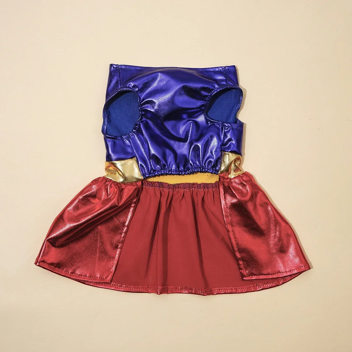 Vibrant Halloween dog costume with a shiny purple and red design for festive celebrations