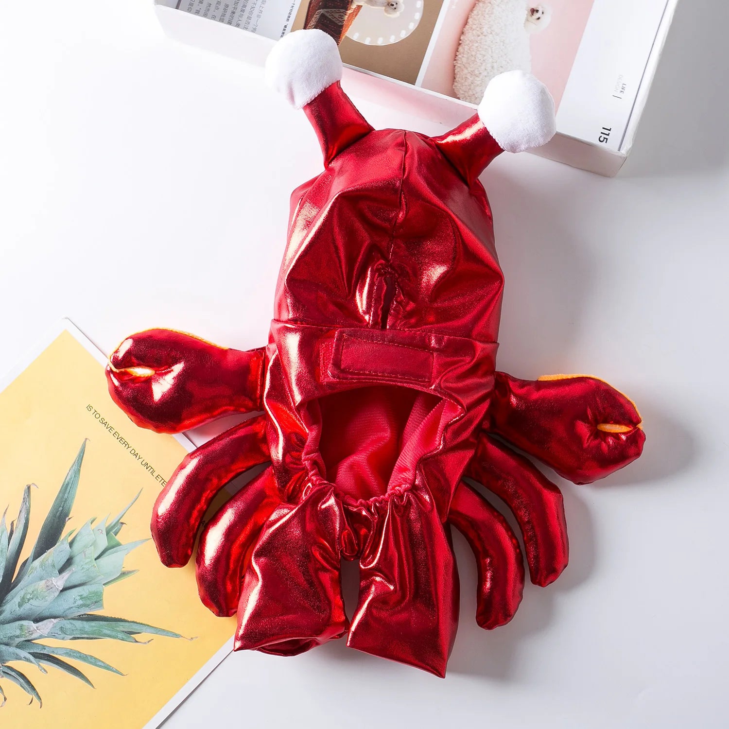 Halloween dog crab costume in shiny red fabric with playful crab claws and eyes