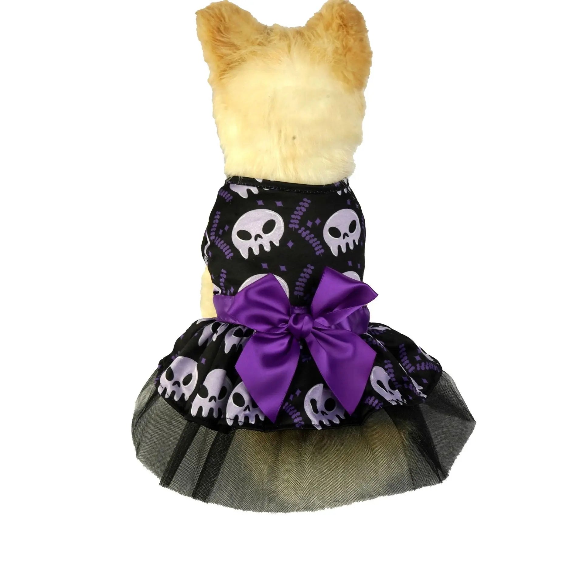Halloween dog dress for small breeds with skull design and purple bow, perfect for festive events