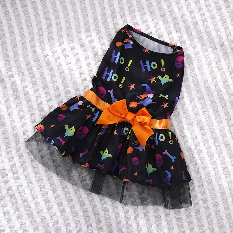 Colorful Halloween dog dress for small breeds with playful skulls and a ribbon belt