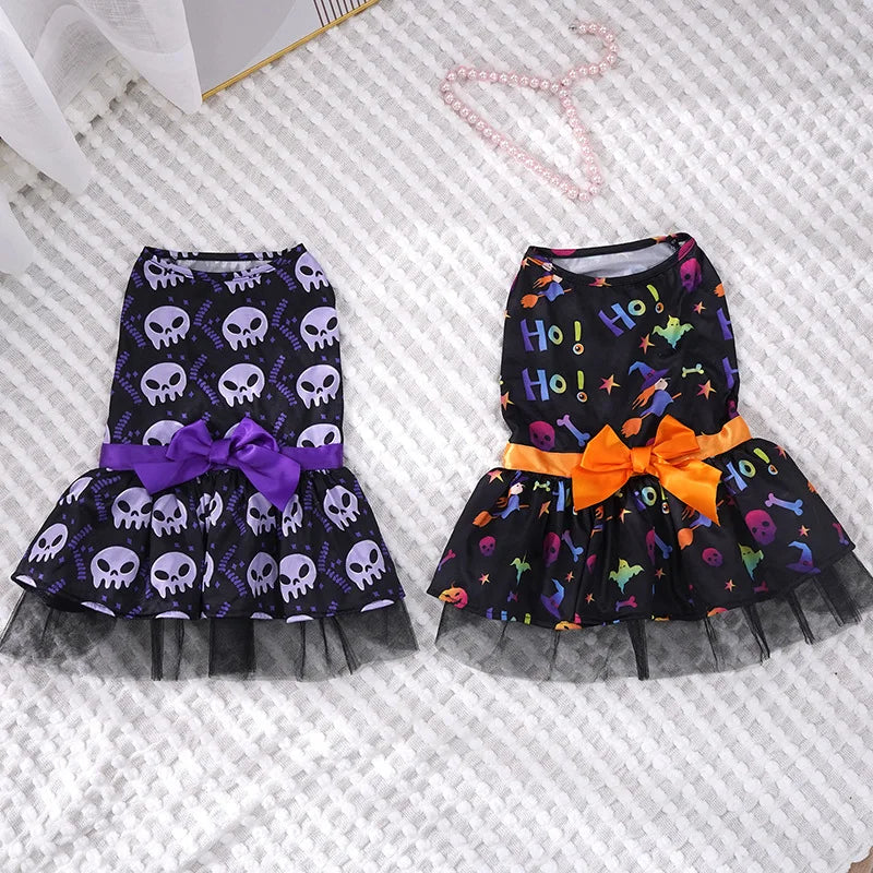 Halloween dog dress for small breeds featuring skull and colorful bat designs with ruffled skirts