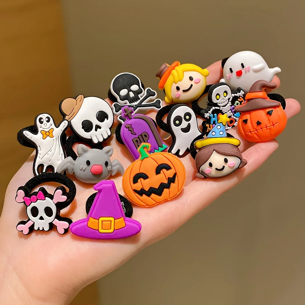 A collection of Halloween hair accessories for girls, featuring ghosts, pumpkins, and skeleton designs