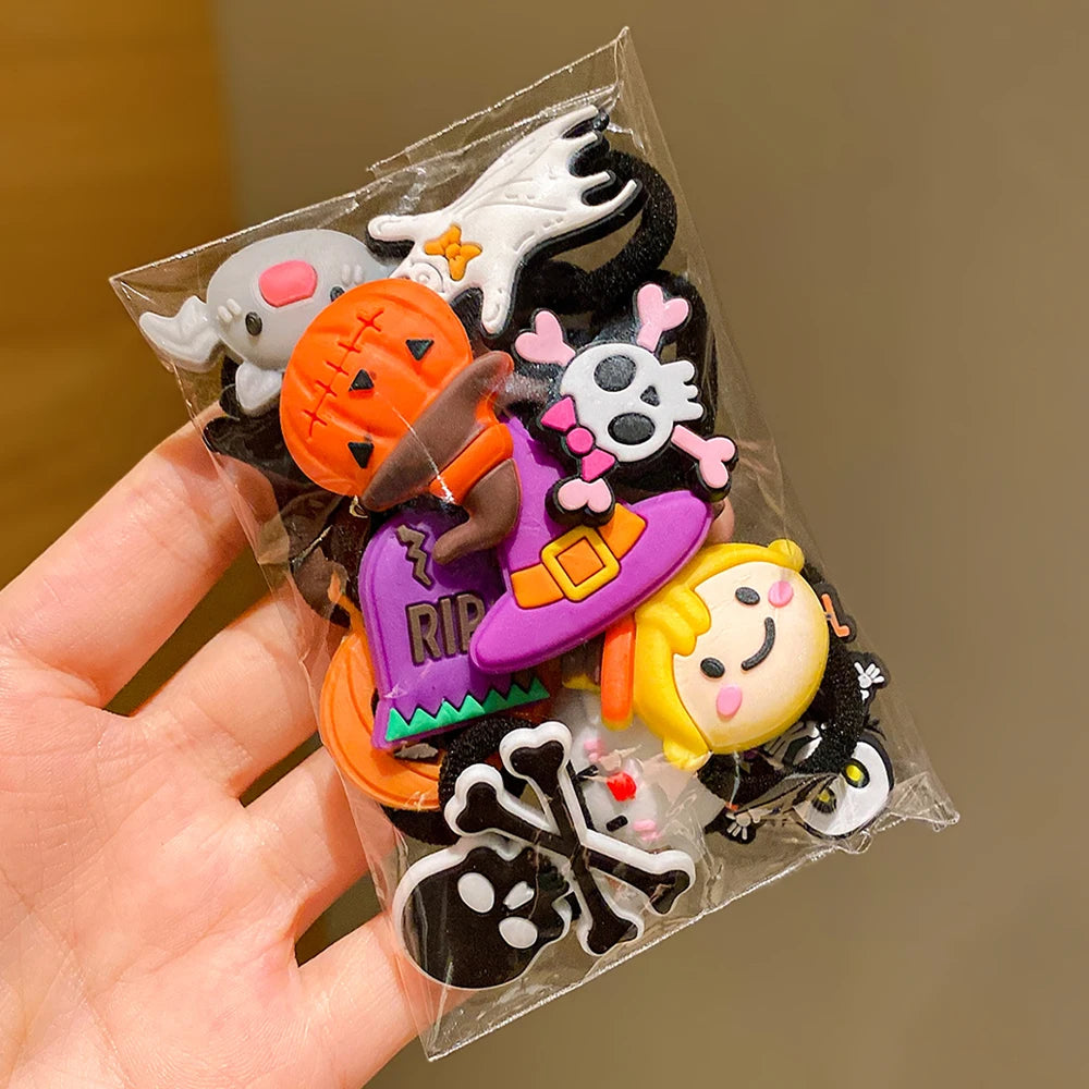 Colorful Halloween hair accessories for girls in a pack, featuring spooky designs and fun decorations
