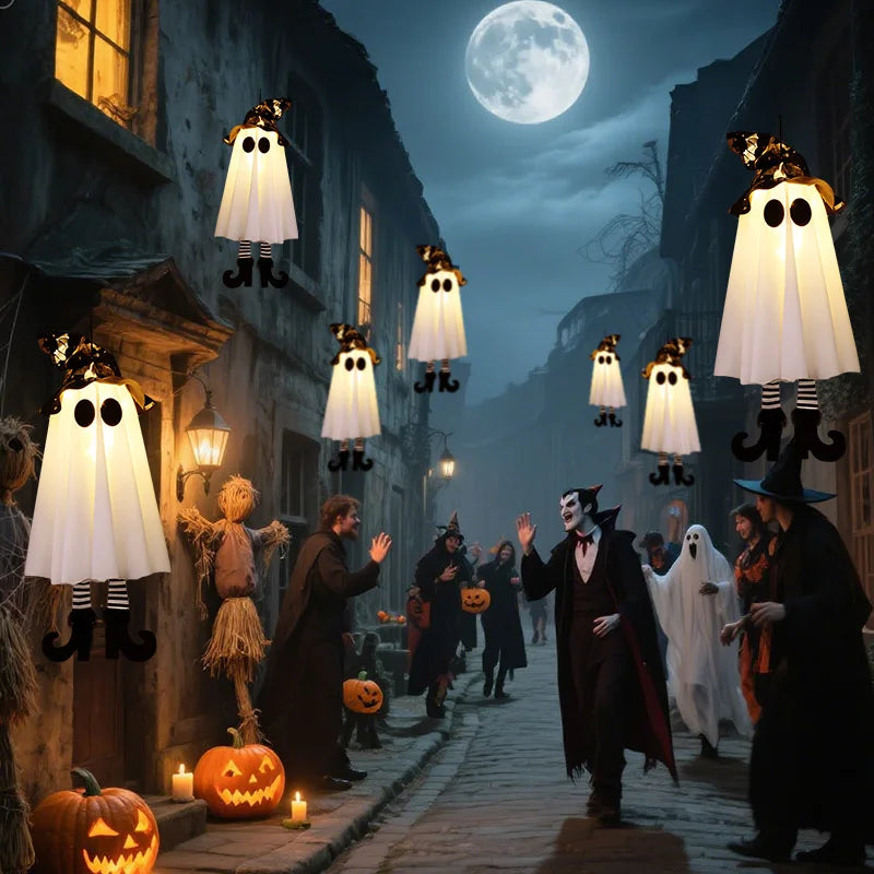 Halloween LED witch ghost decorations illuminating a spooky street with Halloween festivities