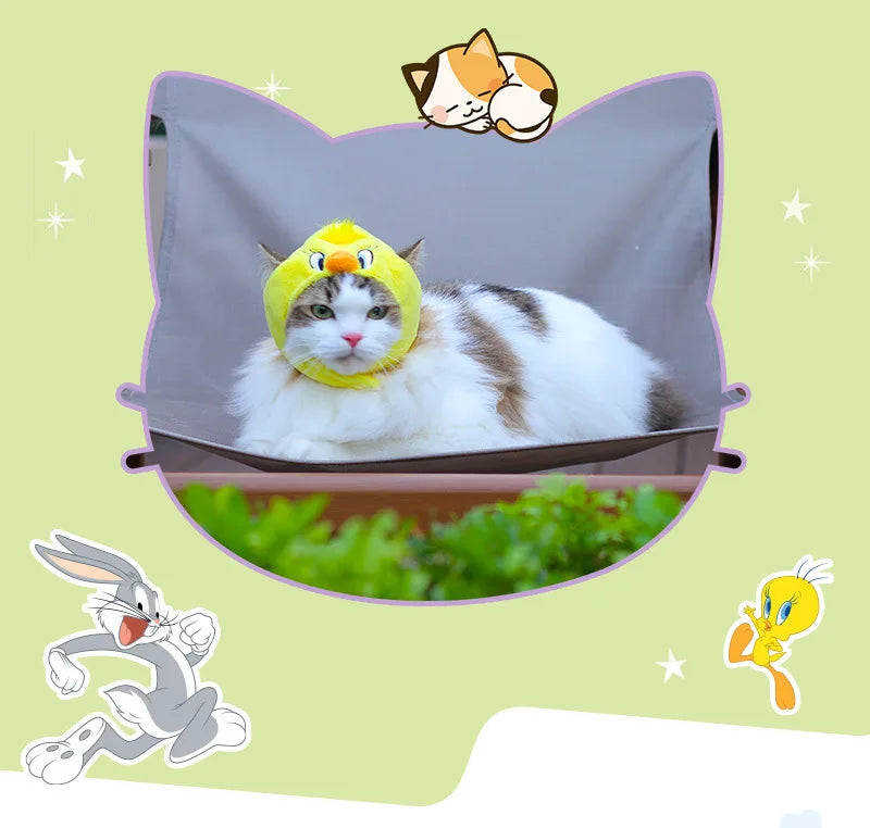 Fluffy cat wearing a Looney Tunes cat Halloween costume with a fun yellow headpiece