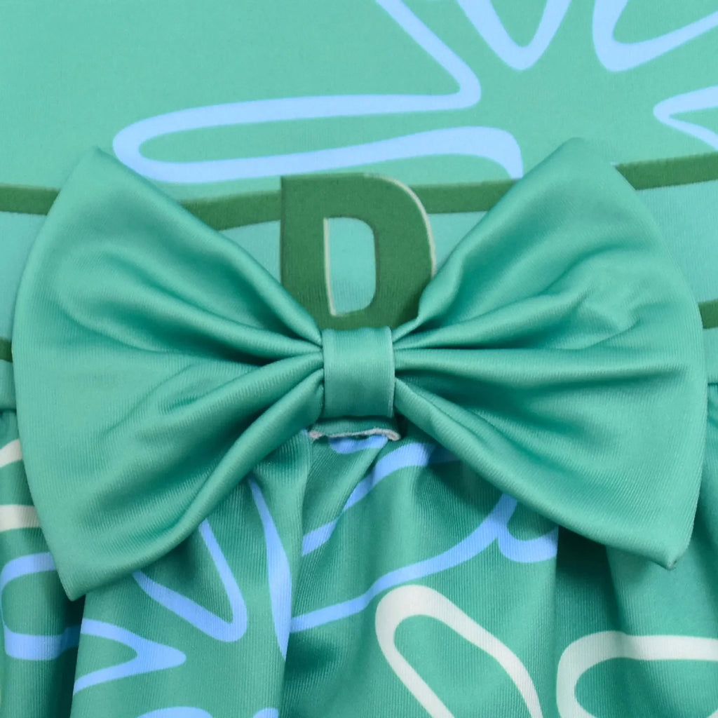 Inside Out Joy Halloween costume with a vibrant green bow and playful design details