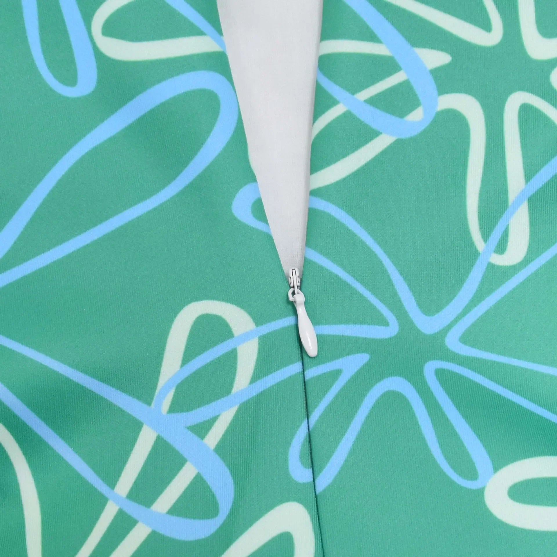 Close-up of the zipper detail on an Inside Out Joy Halloween costume designed for festive celebrations