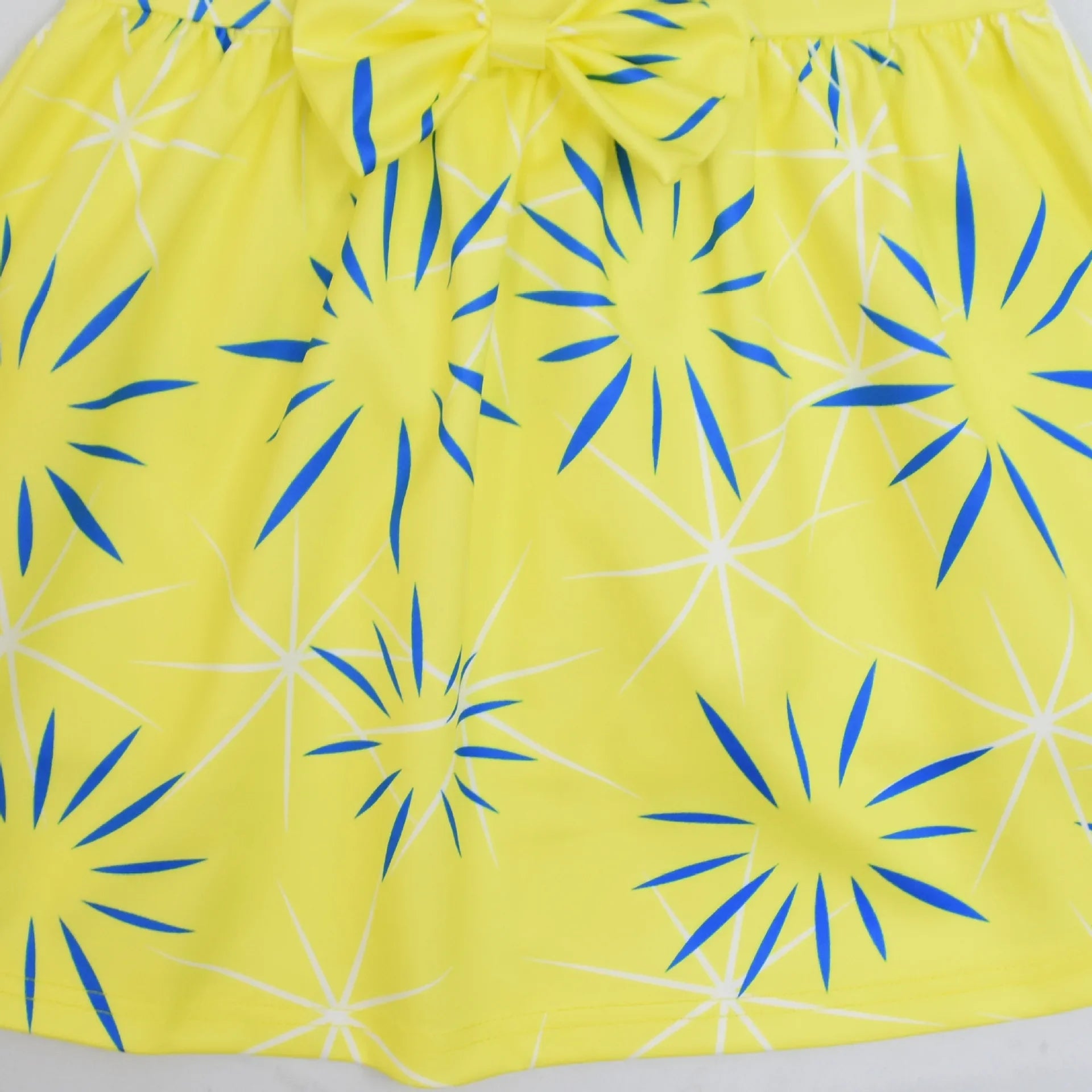 Bright yellow skirt with blue starburst patterns for Inside Out Joy Halloween costume