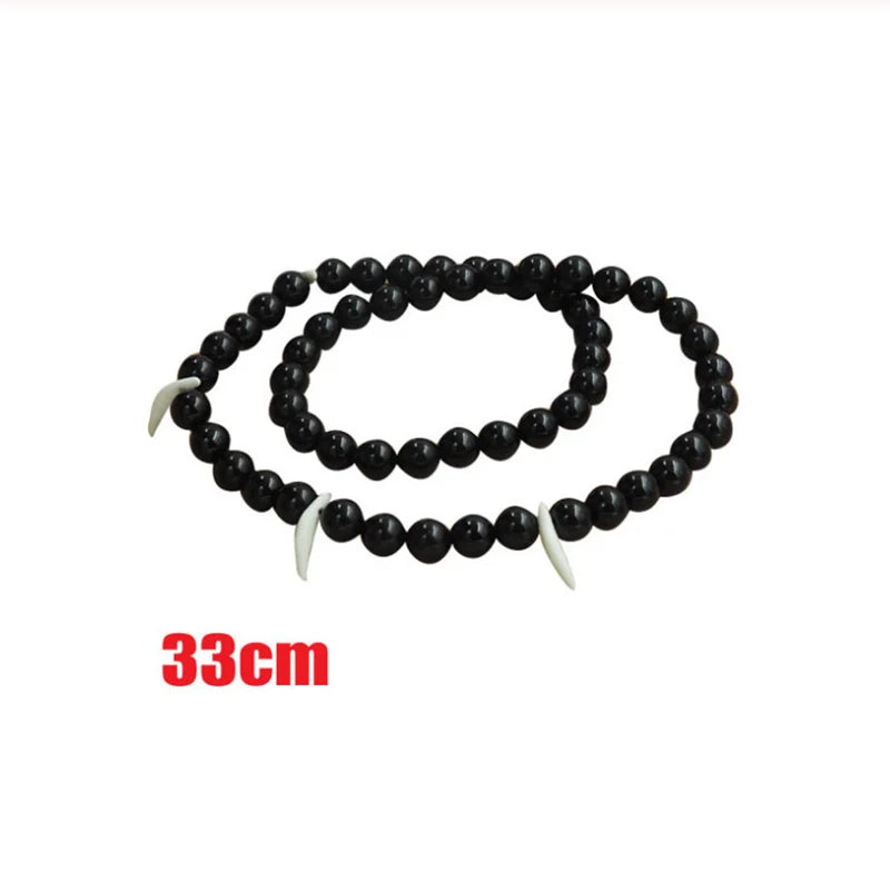 Inuyasha cosplay costume accessory featuring a black beaded necklace with white fangs for fans