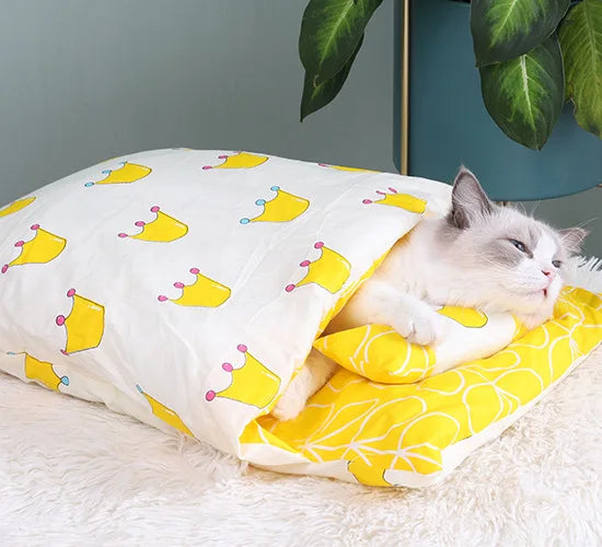 Cozy Japanese cat sleeping bag featuring colorful crown patterns for comfortable pet naps