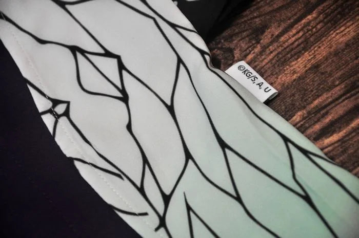 Close-up of fabric showing details of a Japanese dog kimono costume from Zoomies & Co