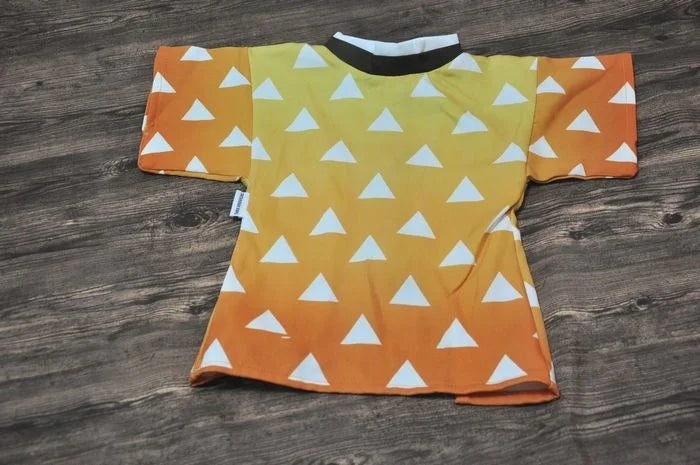 Japanese dog kimono costume in orange and yellow with a triangle pattern for stylish pets
