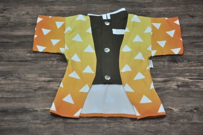 Japanese dog kimono costume featuring a vibrant orange and yellow triangle pattern for pets