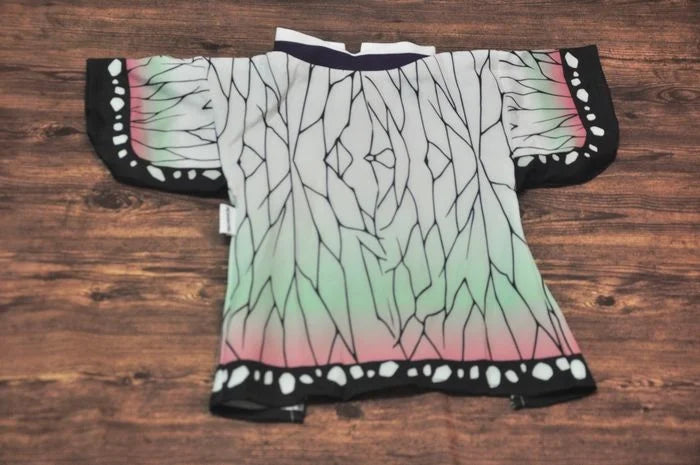 Japanese dog kimono costume featuring a colorful tree branch design for stylish pet dressing
