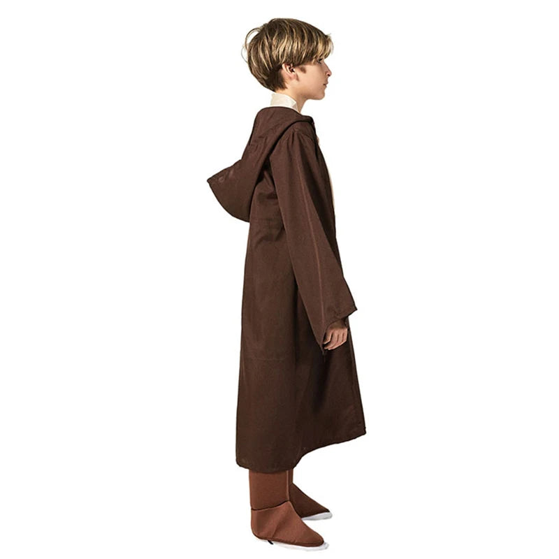 Child wearing a brown Jedi Halloween costume for kids with hood and flowing sleeves