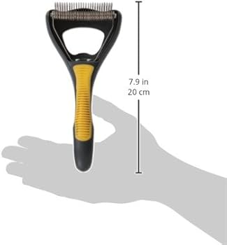 JW Pet grooming brush for dogs with ergonomic yellow and black handle, 7.9 inches long