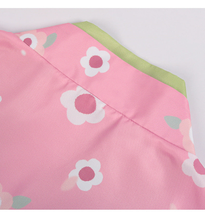 Close-up of the Kanroji Mitsuri cosplay costume featuring a pink floral design for anime fans