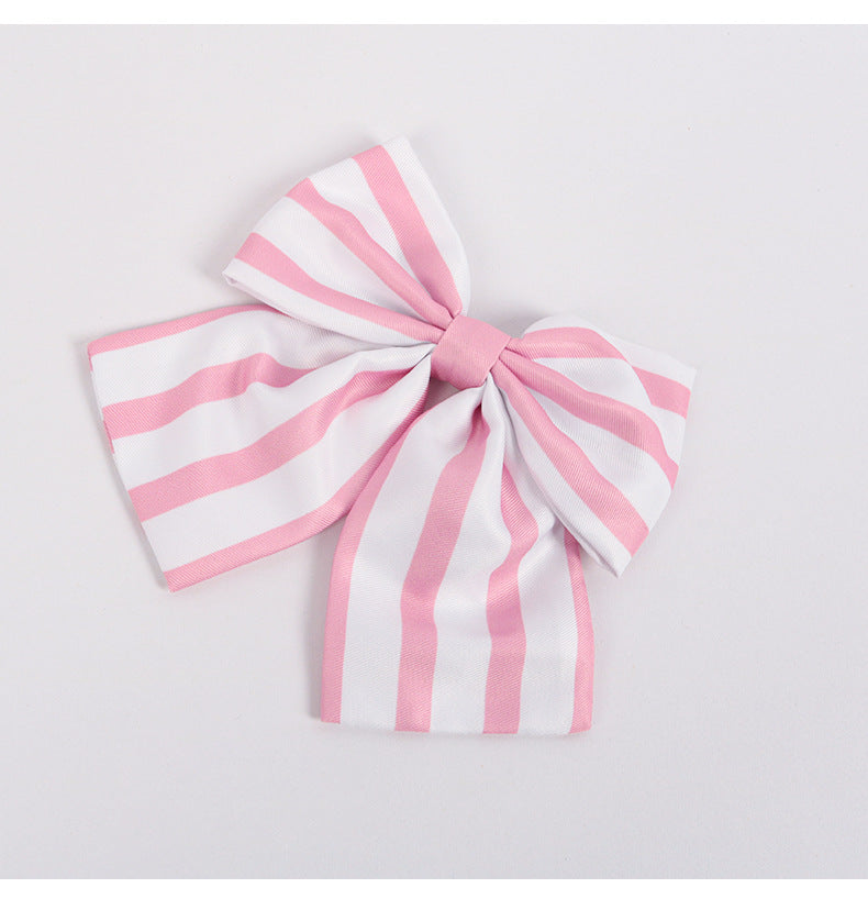 Kanroji Mitsuri cosplay costume accessory featuring a large pink and white striped bow