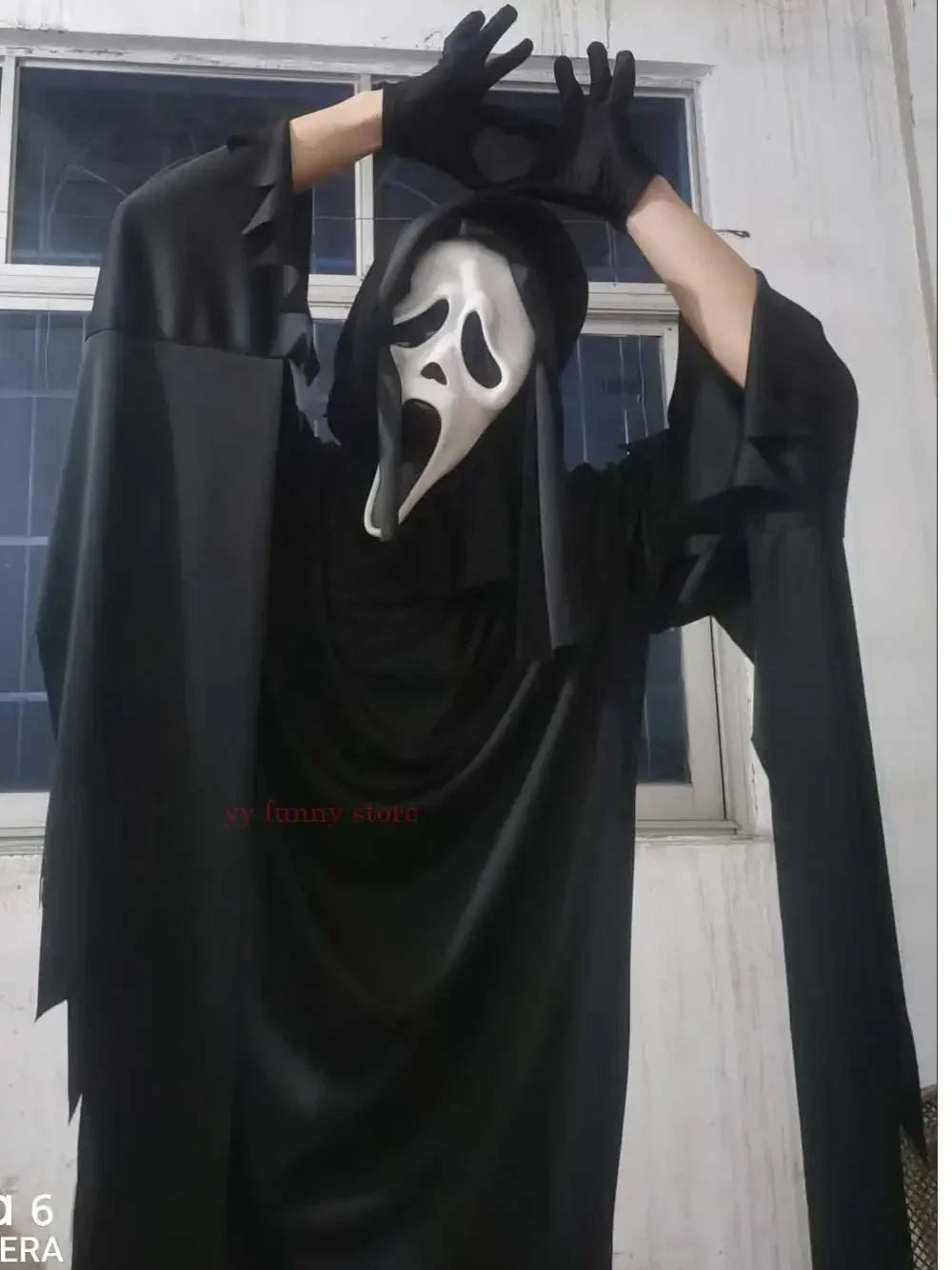 Kids scream costume Halloween 2025 with black robe and signature ghost face mask for spooky festivities