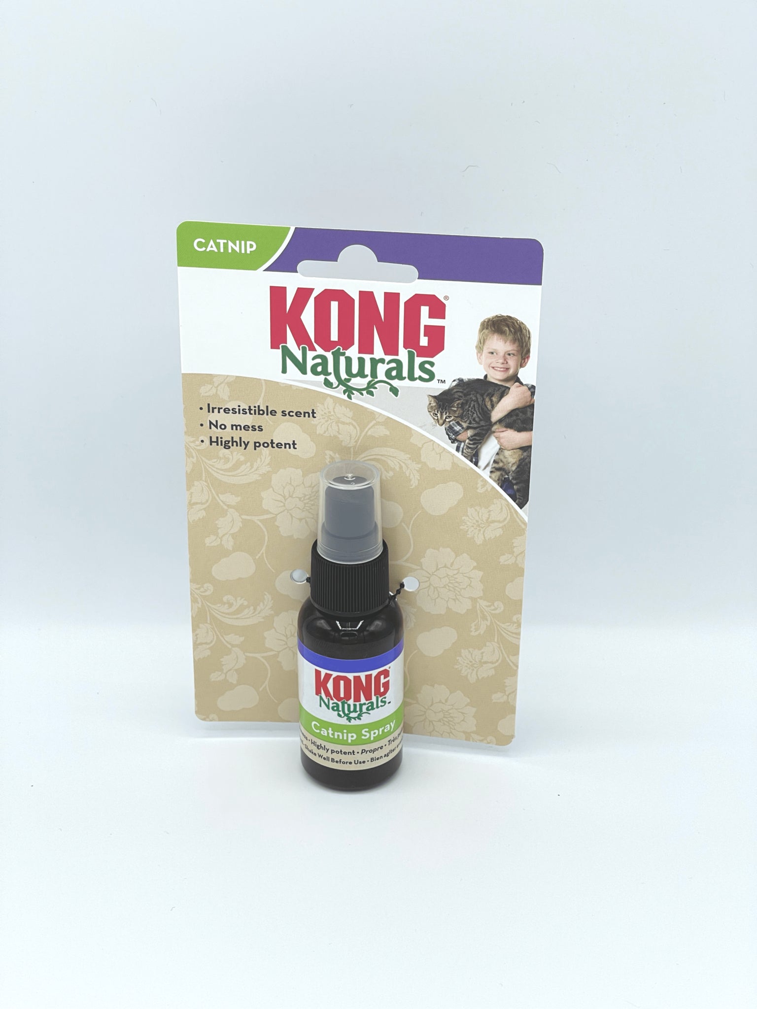 KONG catnip spray 1.4 oz bottle with packaging featuring child holding a cat and product benefits