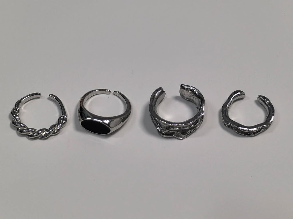 Set of four silver rings featuring unique designs for Demon Hunters Rumi cosplay clothes for carnival