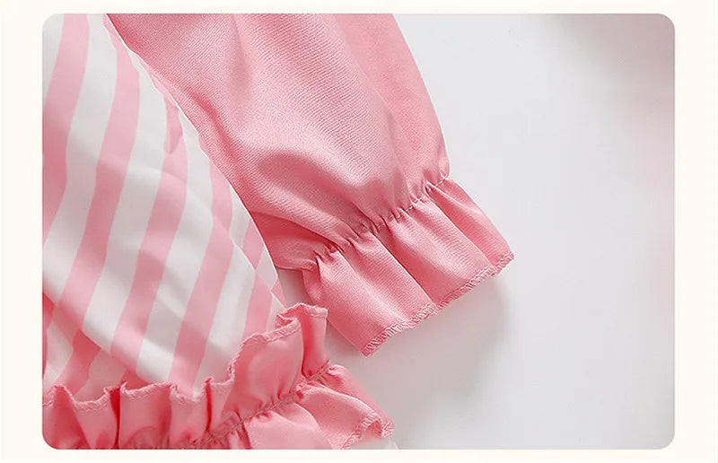 Close-up of pink fabric with ruffled sleeves for Kuromi princess dress for kids