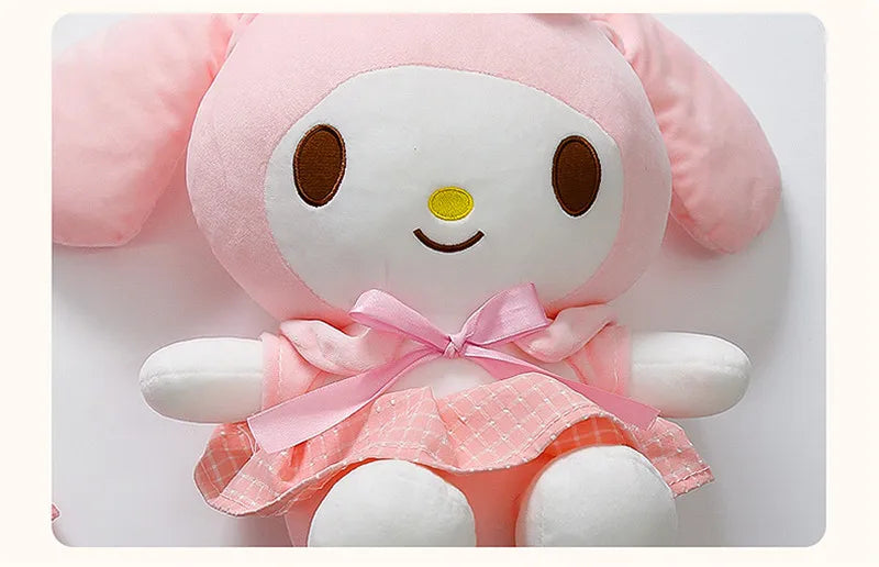 Cute plush My Melody doll wearing a pink dress with a bow, perfect for kids who love Kuromi princess dress for kids.
