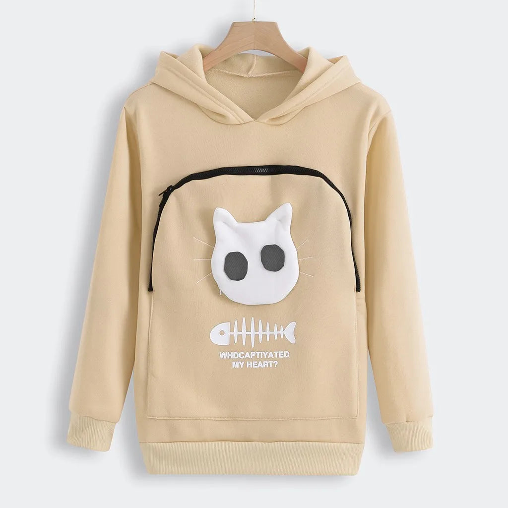 Beige cat lover sweatshirt with pouch featuring a playful cat face design and bone graphic