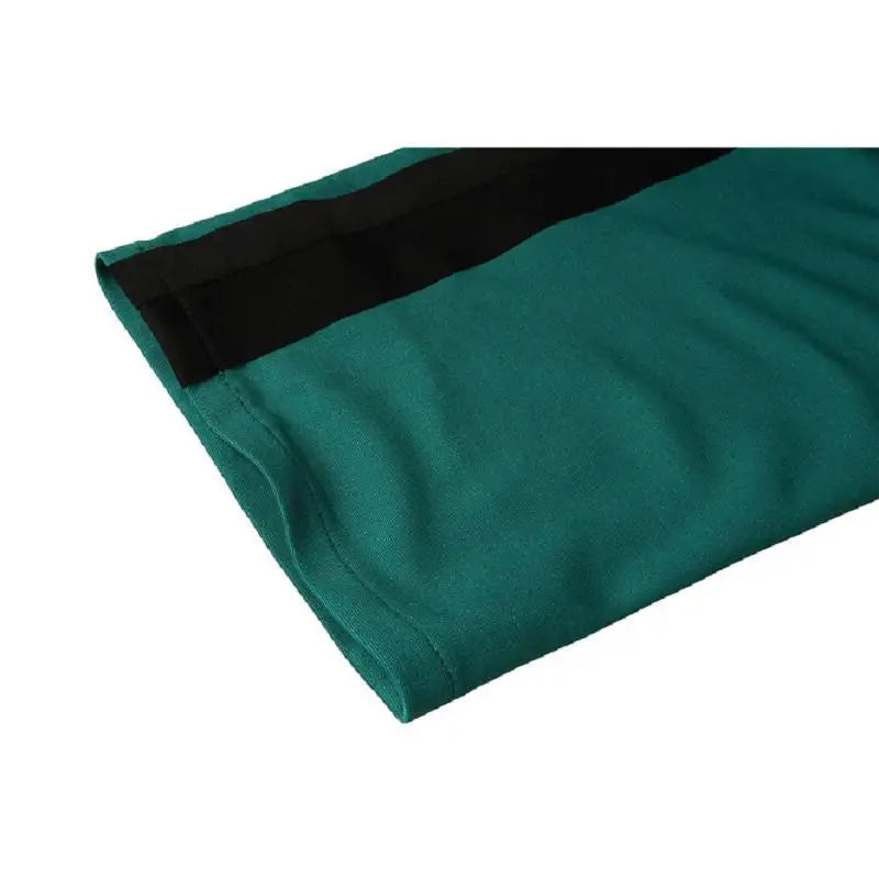 Close-up of My Hero Academia cosplay costume fabric showing teal color with black detailing