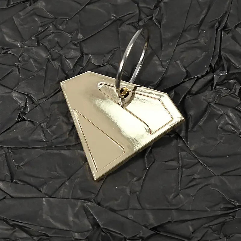 Krypto cosplay dog costume accessory featuring a shiny gold dog tag pendant design