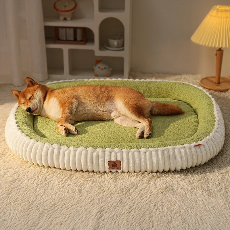 Cozy orthopedic dog bed with bolster in green and white, designed for comfort and support for pets