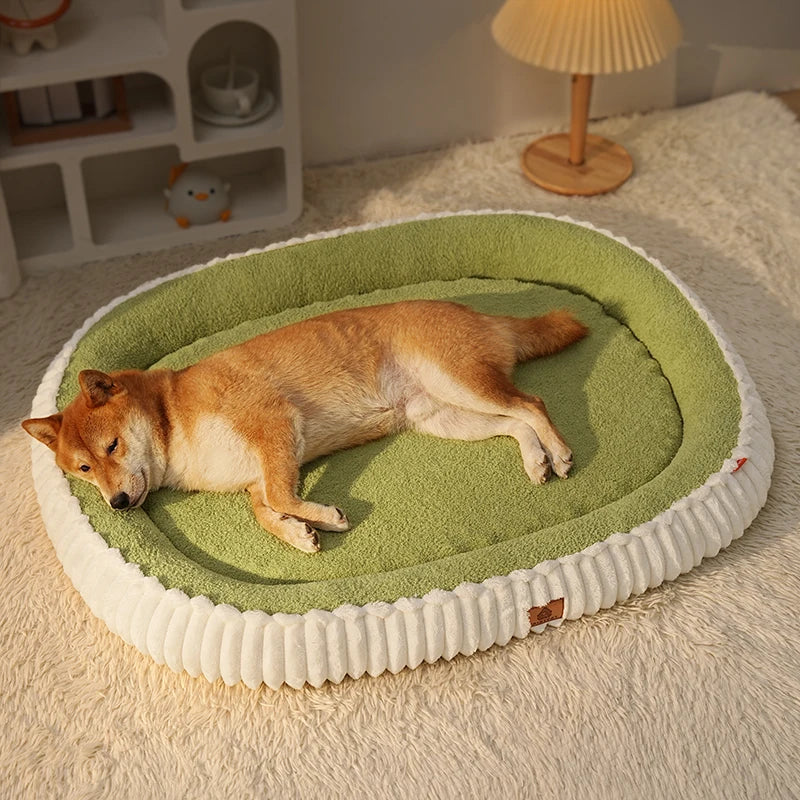Cozy orthopedic dog bed with bolster in green and white, ideal for comfort and support for pets