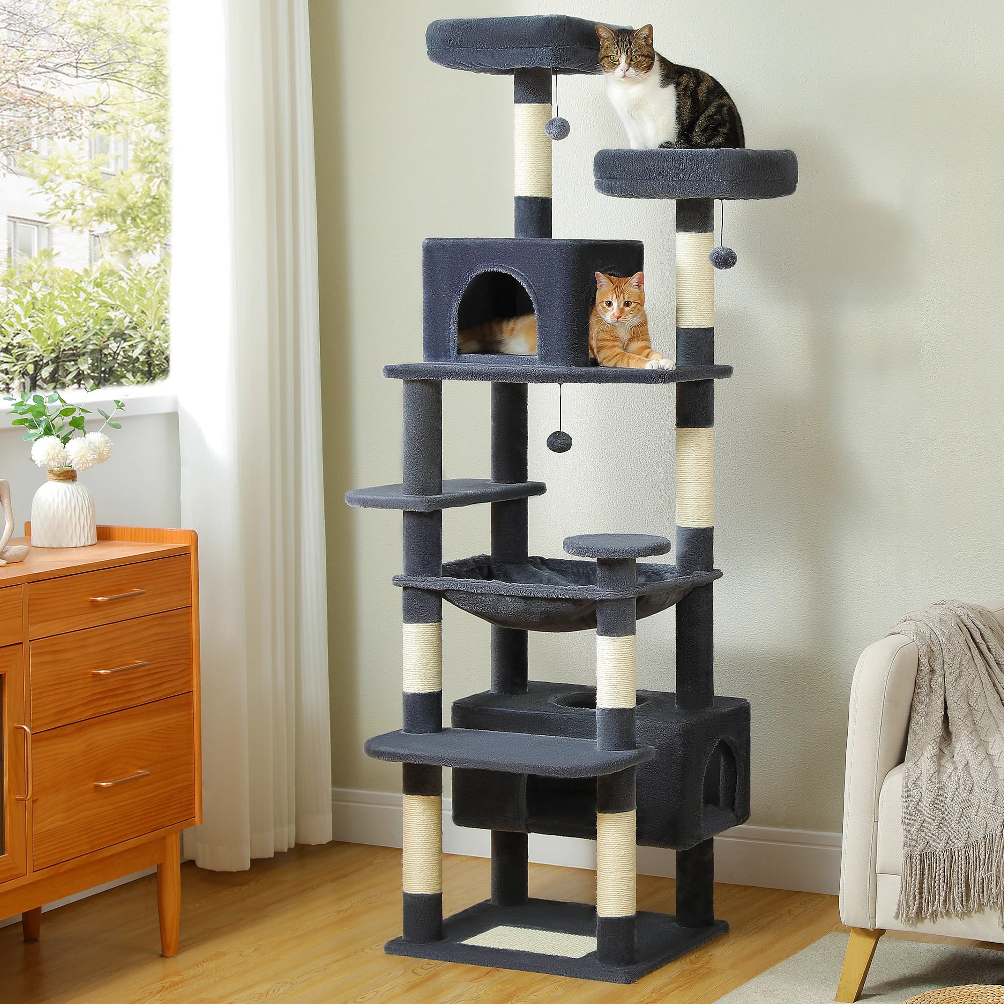 Large cat tree for indoor cats featuring multiple levels and cozy spaces for relaxation