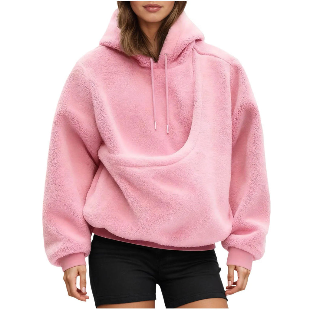 Pink hoodie from Zoomies & Co featuring a pet carrier hoodie design for carrying small pets comfortably