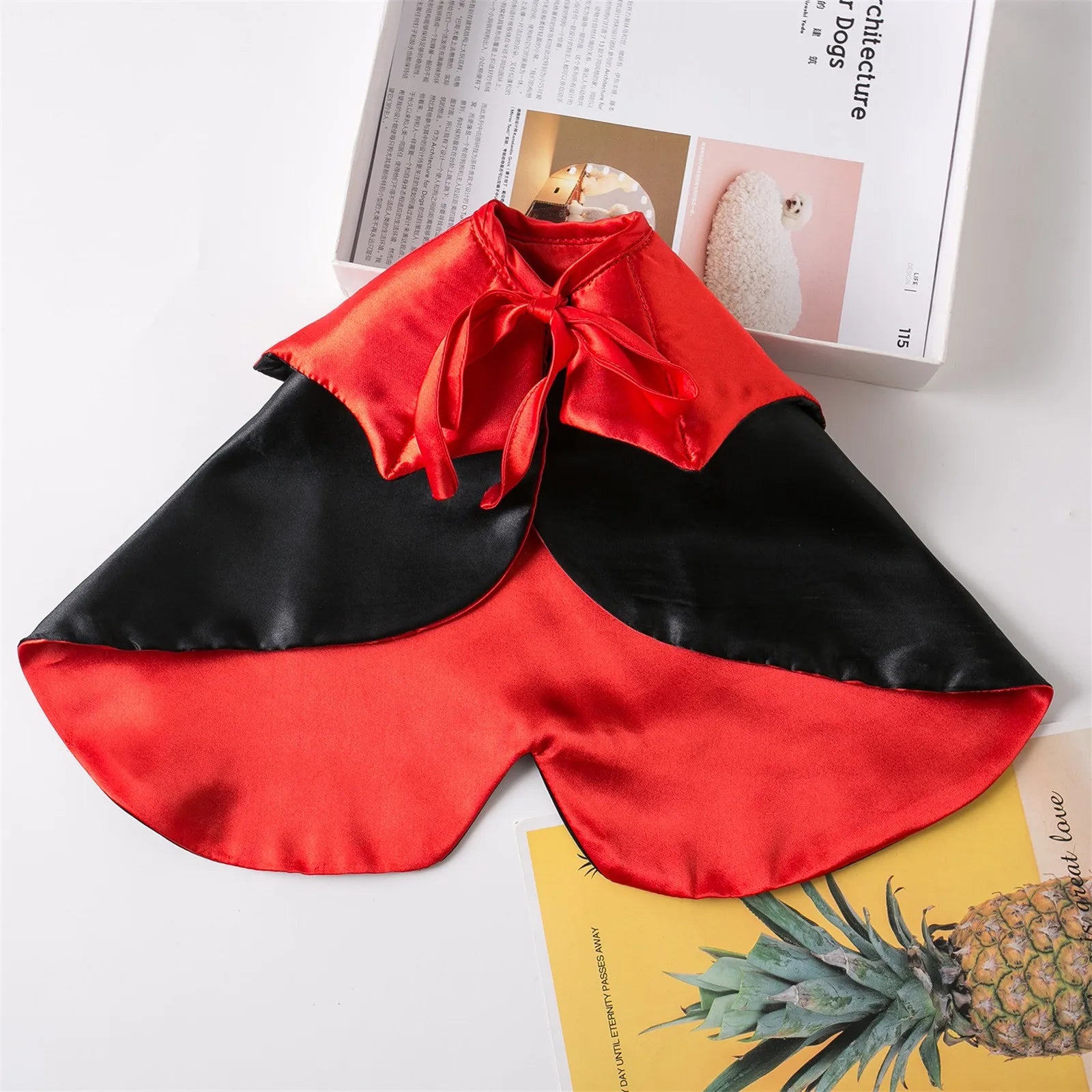 Zoomies & Co pet vampire cloak for Halloween in red and black with a satin finish